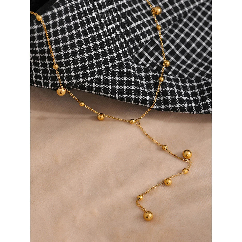 Elegant Gold Bead Pendant Necklace