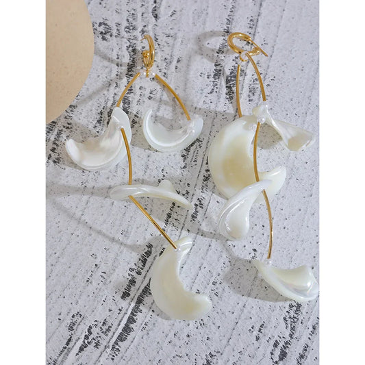 Dangling pearl earrings